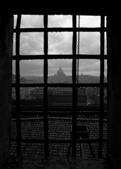 Rainy day in Rome Italy 15.06.2014. View throw the grilled window of St.Angel castle.