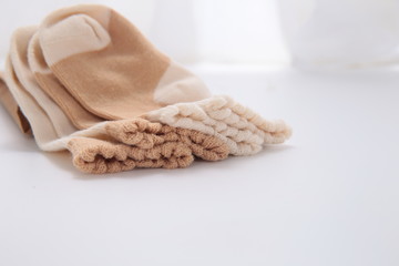 yellow sock close-up on isolated white background