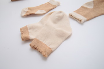 yellow sock close-up on isolated white background