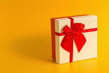 Gift Box on a yellow color background.
