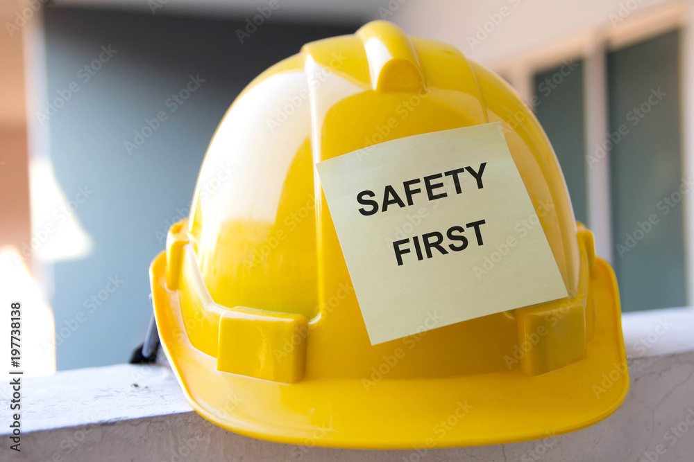 Wall mural helmet with safety first warning message