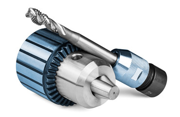 Spiral flute tap and chuck with jaws on white background. Close-up of decorative steel tools for...