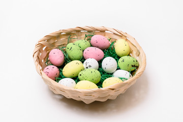 Colorful Easter Eggs in a Basket with Green Paper Grass - Easter Celebration Decoration 