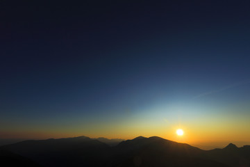 Poland, Tatra Mountains, Zakopane - sunset over Western Tatra Mountains range - Tomanowa Przelecz Pass and Tomanowy Wierch peak