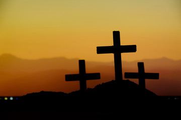 Crucifixion Of Jesus Christ At Sunrise - Silhouette Three Crosses On Hill