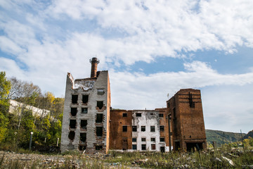 Fototapeta premium The old destroyed plant and buildings in which no one lives