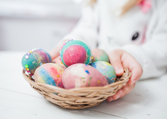 Fototapeta na wymiar Easter eggs in basket