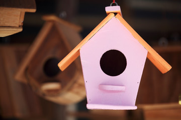 Obraz na płótnie Canvas close up of colorful simple wooden bird house