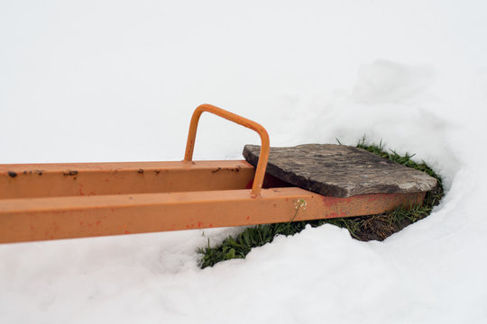 Children swing in the snow 