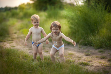 Fototapeta premium Happy twins outdoor