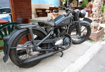 Vintage motorcycle on the street in the city.