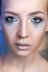 beautiful blond girl with sparkling makeup