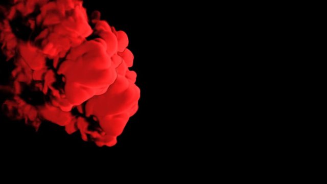 Abstract stylized Red ink drop in water on a black background for effects with Alpha channel matte. 3d render. voxel graphics. computer simulation V9