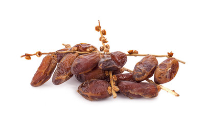 dried fruits from date palm isolated on white background