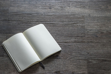 Mockup book, blank open page catalog, magazine, brochure, pocket booklet template paper texture on dark grey wood table