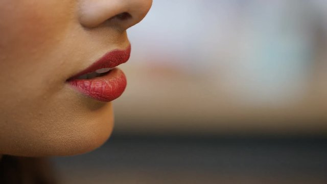 Close up of female mouth talking