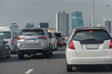 Fototapeta na wymiar traffic jam with row of cars on toll way