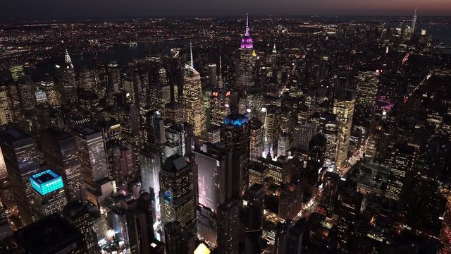 New York City aerial view of Midtown and Lower Manhattan at night, from 8th Ave by Times Square