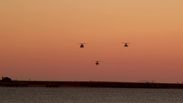 Helicopters returning back to base in the evening