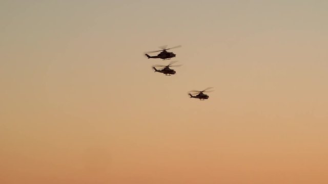 Helicopters returning back to base in the evening