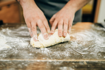 Homemade pasta cooking, dough preparation on table