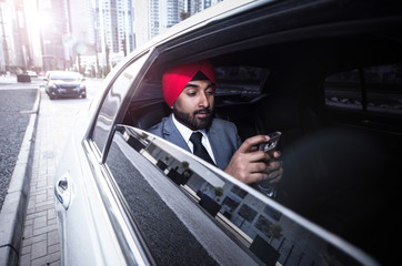 Fototapeta na wymiar Indian businessman his company car in India