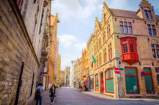 Beautiful narrow streets and traditional houses in the old town of Bruges (Brugge), Belgium