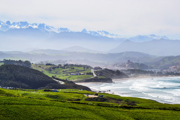 Landscape near Oyambre Beach, in San Vicente de la Barquera, Cantabria, Spain. At the bottom, the...