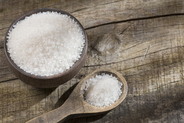 Fototapeta na wymiar White refined sugar in the bowl
