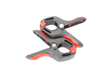 Obraz premium Plastic spring clamp on white background, Isolated.