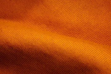 Zelfklevend Fotobehang texture of a orange fabric background © dip95