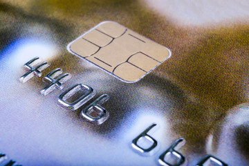 Credit card. Macro shot. Close Up Credit card payment. Background. Macro shot of chip and pin credit card. Credit and finance concept.