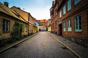 Fototapeta na wymiar Lund - October 21, 2017: Streets of the historic center of Lund, Sweden