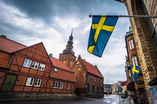 Ystad - October 22, 2017: Swedish national flag at the historic center of the town of Ystad in Skane, Sweden
