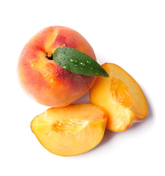 Peach with leaves.