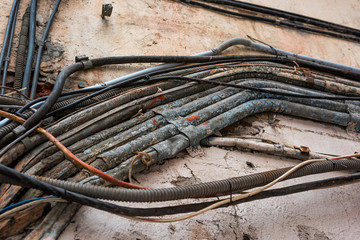 Old cables on the street, the danger of poor wiring