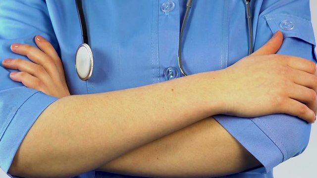 Doctor posing to camera, medical reform, qualified personnel in country regions