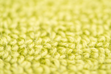 bath towel bright green color, macro shooting. textured fabric background