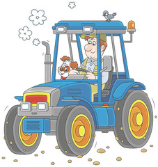 Smiling worker driving his wheeled tractor