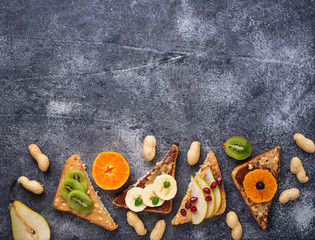 Healthy  sandwiches with peanut butter and fruits