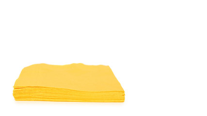 Yellow paper napkin for food isolated on white background. Kitchen serving object. copy space, template