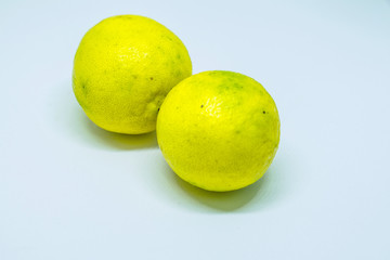 Lime. Fresh fruit with leaf isolated on white background.