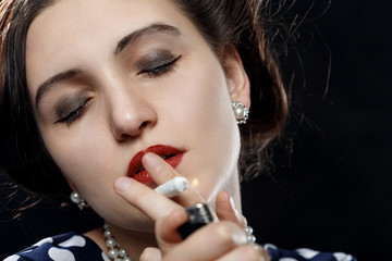 Obraz premium woman smoking joint