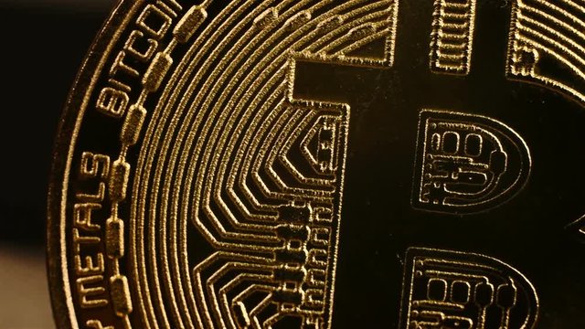 Golden Bitcoin Cryptocurrency. Virtual Coins. Extreme Close Up