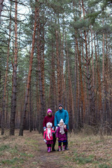 Fototapeta premium Rural family in autumn forest