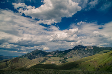 Poison Peak Ranch homestead in the Lemhi range of northeastern idaho near salmon idaho and the salmon river with rugged mountains and clouds