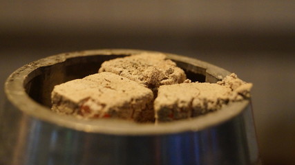 three of coal from a hookah