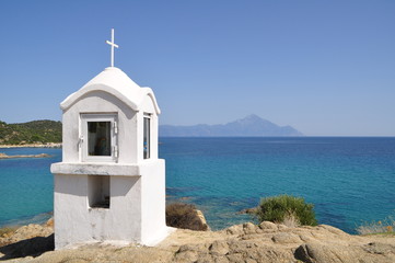 Small shrine on Sithonia, Greece. In the background you can see Mount Áthos.