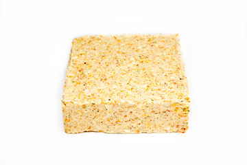 briquette of pea soup on white background