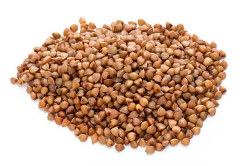 Buckwheat grains isolated on the white background.